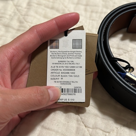 New with tag Burberry reversible black/tan belt with gold hardware. Medium size. - Picture 4 of 6